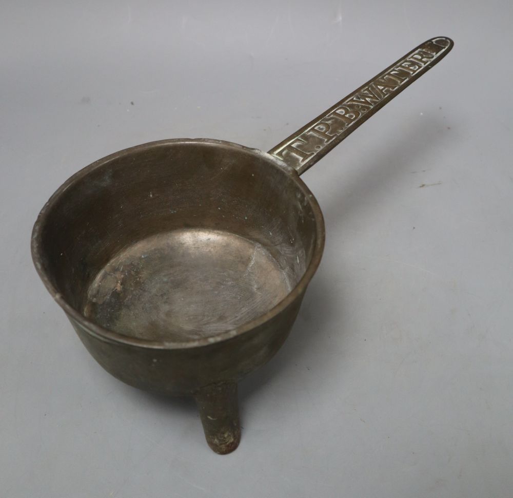 A T.P.B. Water bronze skillet, overall length 38cm